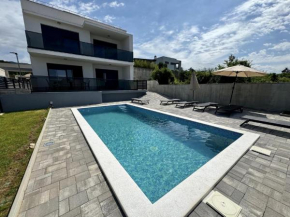 Modern villa with swimming pool and roof terrace